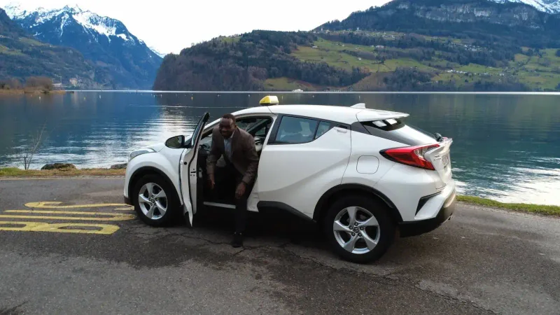 Nile Taxi against the mountain and lake scenery of Schwyz
