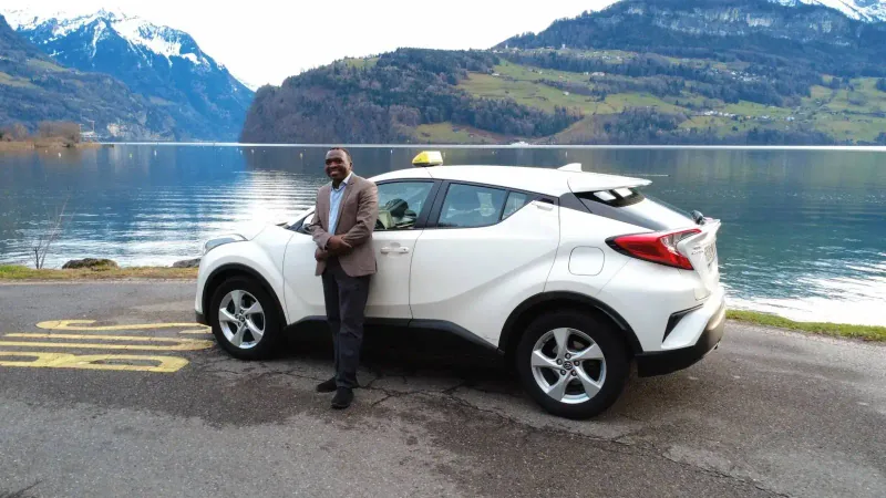 Nile Taxi with its driver beside Lake Lucerne